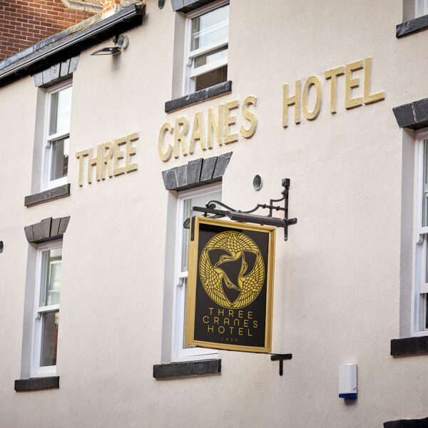 An exterior view of Three Cranes Hotel